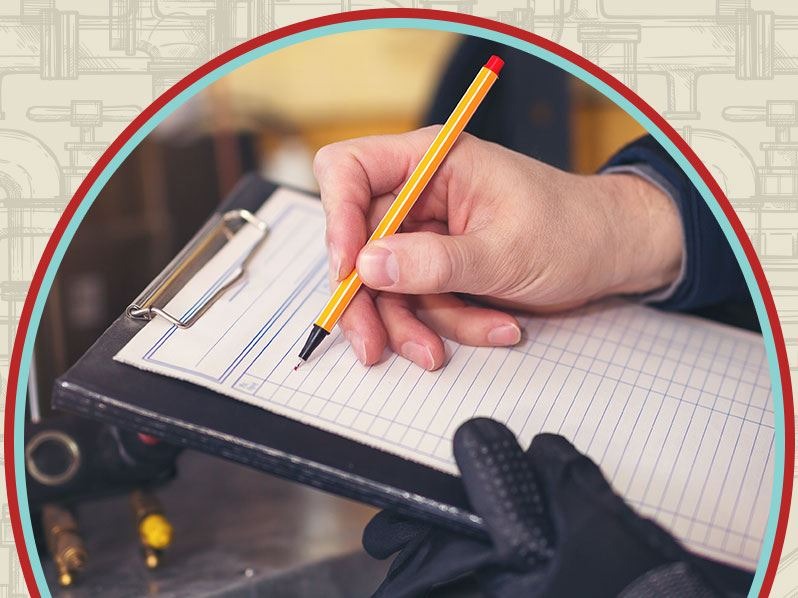 Man holding clipboard with checklist in home