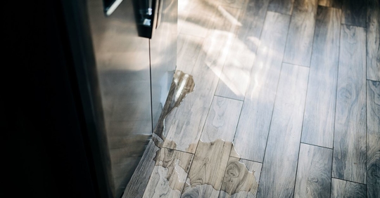 refrigerator leaking onto kitchen floor